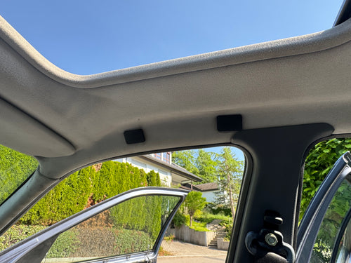 BMW E36 coat hanger delete installed in rear interior