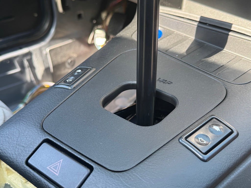 BMW E36 shift boot delete cover installed in center console