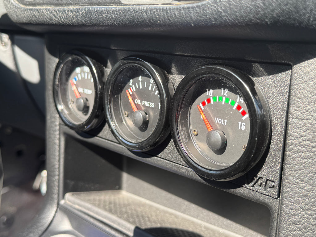 BMW E36 console gauge face installed with 52mm gauges